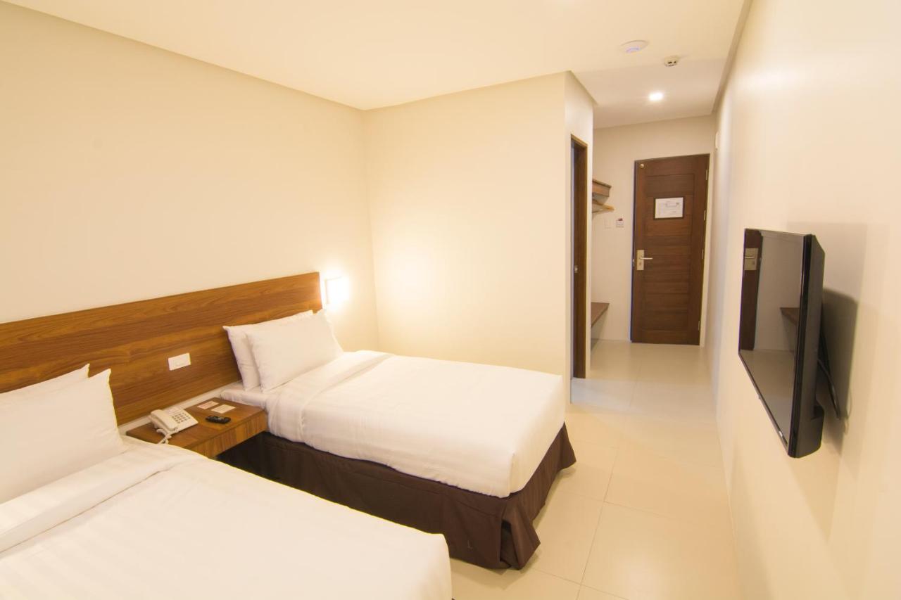 Mango Suites Cauayan Экстерьер фото